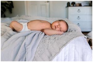 newborn boy on bedding from target