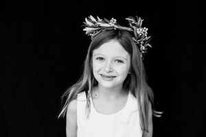 black and white image of girl in a flower crown
